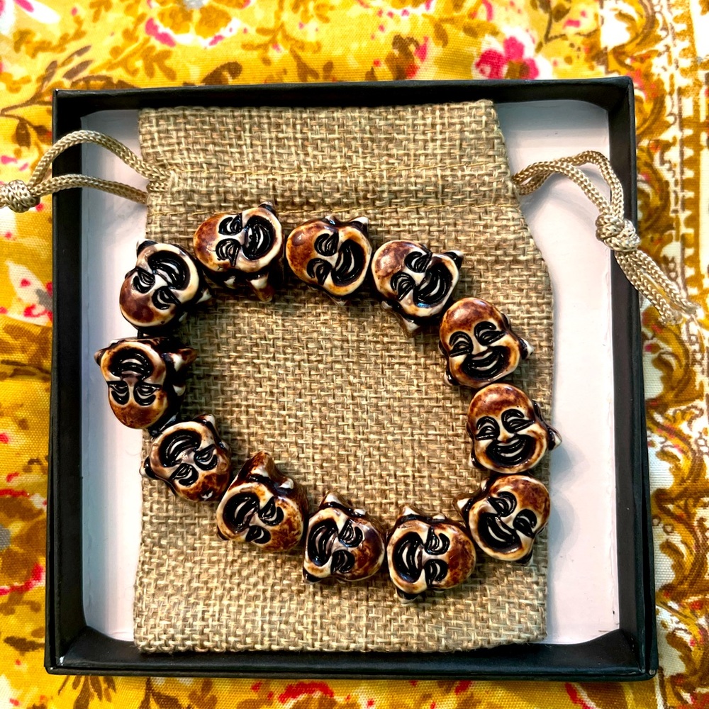 Laughing Buddha bracelet.